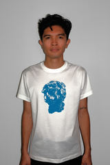 picture of man in white short sleeve t-shirt with blue screenprinted image of a dog-like creature with "CASPER CHOA" logo above