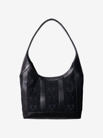 Black leather handbag with black/black heart-patterned jacquard on a white background